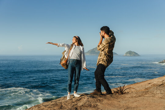 The light we chase: A couple exploring the beach together