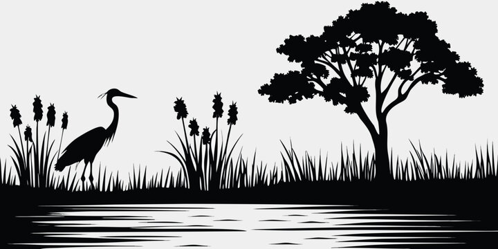 A serene black and white silhouette of a heron by the water s edge