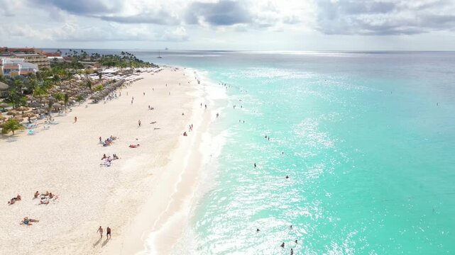 4K Aerial Drone Footage Flying from Sea Across Eagle Beach in Aruba, Caribbean