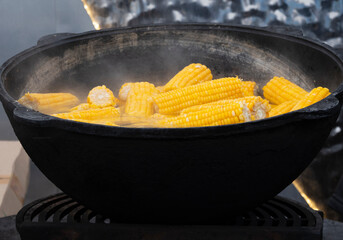 Boiling Corn on the Cob in Traditional Pot