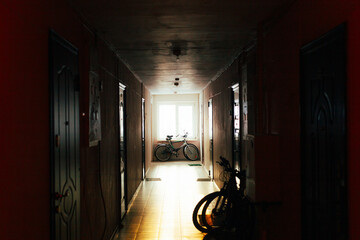 Night Shift Worker Resting Moment, Urban Industrial Corridor With Cyclist And Reflective Decor