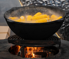 Boiling Corn on the Cob in Traditional Pot