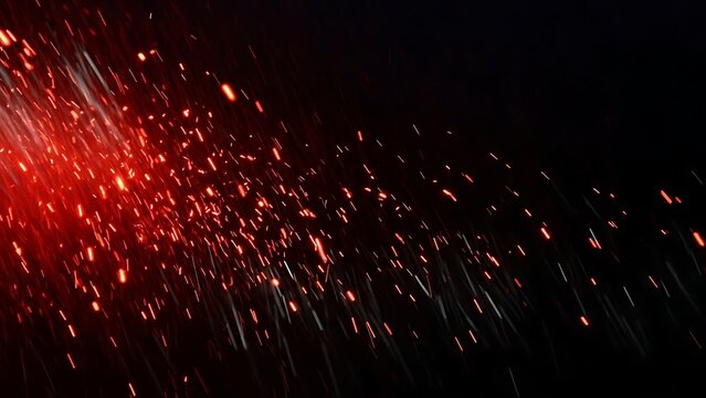 Vibrant red and orange sparkler explosion in dark - Powered by Adobe