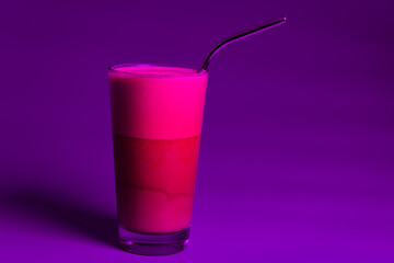 Frappe drink in glass in purple