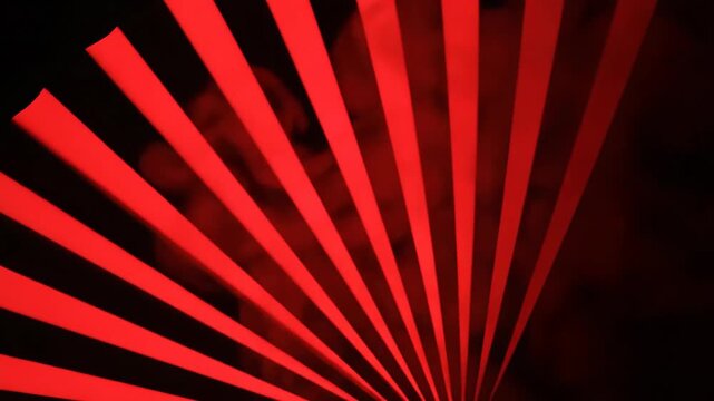 Abstract red rays on black background graphic animation backdrop