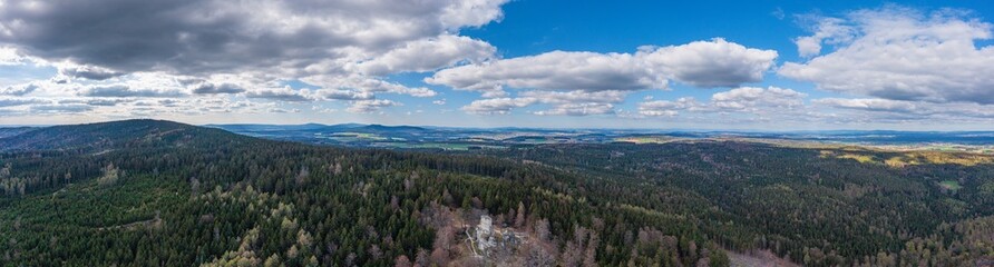 Bird's-eye view of the Wei&szlig;enstein Castle ruins, located in the middle of the forest.