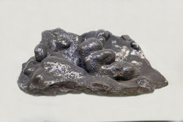 Goethite is black on a light background. Gems, mineralogy, jewelry.