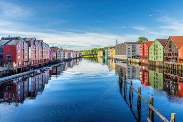 Colorful houses in old downtown of Trondheim, along a river