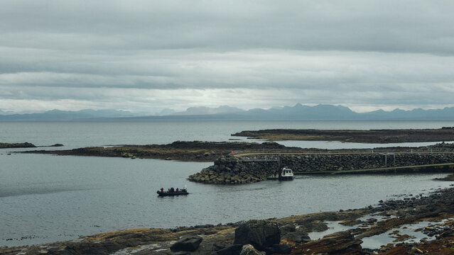 view of the harbour and mountains in the distance