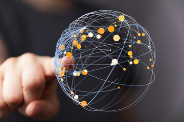 Hand interacting with a digital globe representing global connection, network, and data visualization. Perfect for tech, innovation,