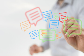 Abstract image of a person interacting with colorful message bubbles. Concept of communication, social media, connection, and data visualization