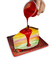 Top view of rainbow crepe cake, focus selective