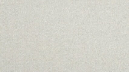 A close-up view of a textured fabric surface with a subtle grid pattern