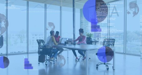 Collaborating three professionals in casual attire working on laptops at office with data overlays