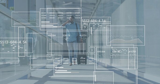 Walking man in blue shirt with bag-strap, phoning, passing glass door in office with data overlay - Powered by Adobe