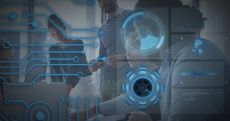 Collaborating five tech pros wearing blazers reviewing laptop with holographic UI in modern office