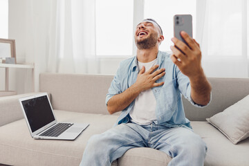 Joyful man enjoying a heartfelt phone conversation, reflecting emotional well-being and the importance of mental health. A moment of connection and authenticity.