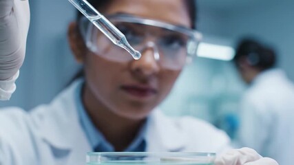 Scientists Conducting Precise Laboratory Experiments with Pipettes in a Modern