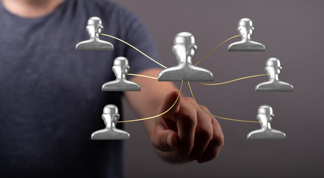 Visualize teamwork, collaboration, and networking with this image. A hand touches a digital network of human figures, symbolizing connections, l - Powered by Adobe