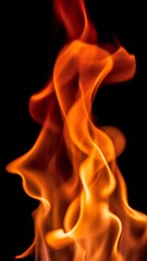 Vibrant orange flames rising against a dark background