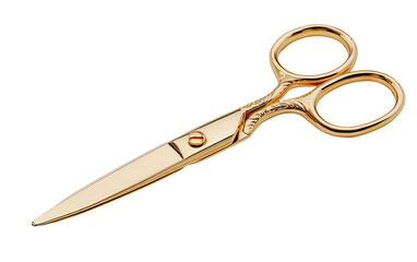 Gold-colored scissors angled on a black background.  A close-up view of the tool.  Ornate handles and sharp blades