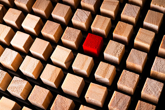 One red-colored Wooden Block in Ordered Structure