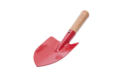 A small red metal shovel with a wooden handle is angled to the right and casting a shadow on the surface on white and transparent