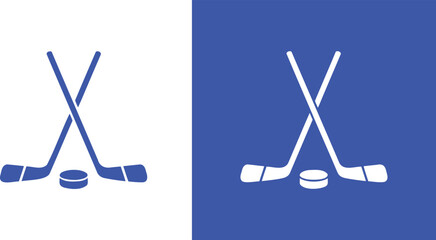 Two blue hockey sticks crossed with a puck sport game