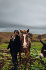 Young Woman with Horse in Autumn Nature