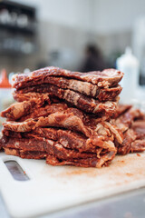 Raw meat at the kitchen close up