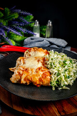 Stuffed pancake baked with cheese.