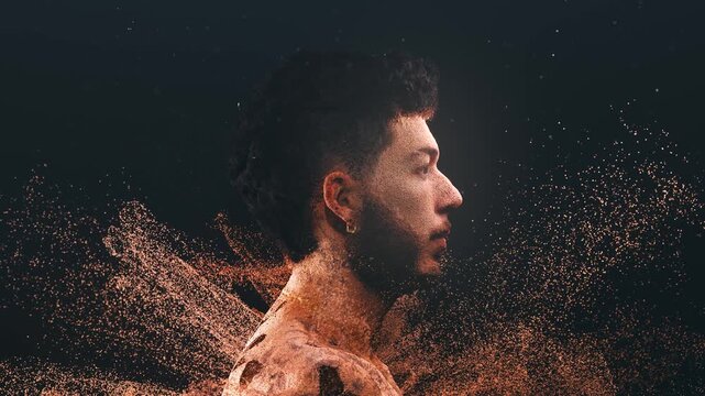 Profile view of a young man dissolving into a cloud of particles. Digital concept of human identity, technology, and virtual reality