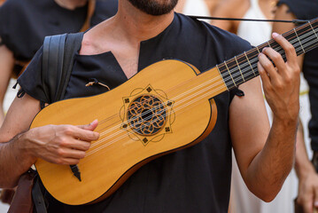 Playing a historical string instrument the concept of medieval music