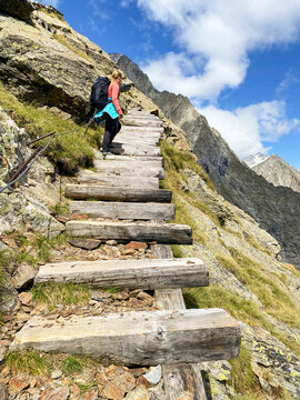 Hiking through the magnificent high mountain landscape with peaks and glaciers of the South Tyrolean Alps in the Antholz Valley near Bruneck, Rieserferner area of ​​the Dolomites, South Tyrol, Italy