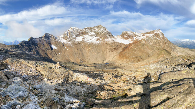 Hiking through the magnificent high mountain landscape with peaks and glaciers of the South Tyrolean Alps in the Antholz Valley near Bruneck, Rieserferner area of ​​the Dolomites, South Tyrol, Italy