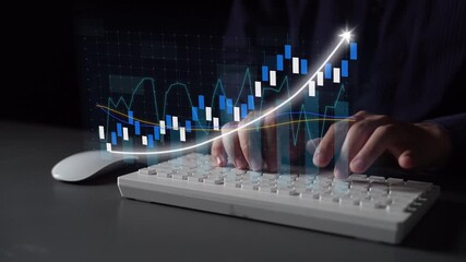 A focused scene featuring hands typing on a keyboard with a background of stock market data visualization, highlighting financial growth and trends in a digital workspace. Copula - Powered by Adobe