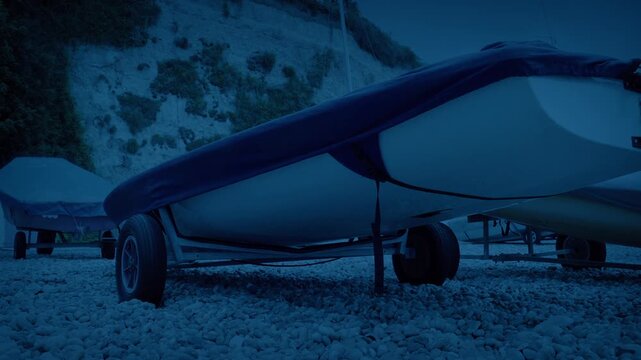Boats On The Beach At Dusk