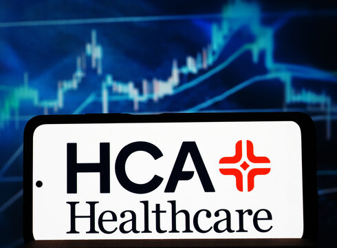In this photo illustration,  Hospital Corporation of America (HCA Healthcare, Inc.)  logo seen displayed on a smartphone.