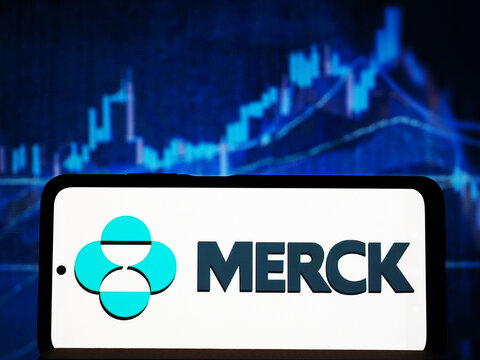 In this photo illustration,  Merck Group  logo seen displayed on a smartphone.