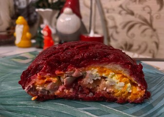 Herring under a fur coat, herring in a roll with carrots, boiled egg, beets, and boiled potatoes, all smeared with sauce, homemade food, cooking deliciously at home, holiday food, delicious, cooking