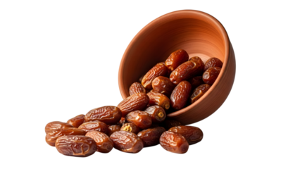 Spilled almonds from a terracotta bowl on a black background