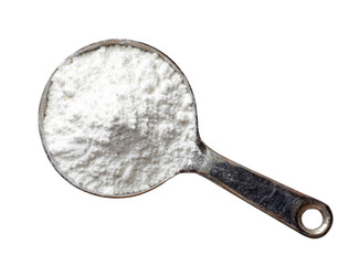 Measuring cup filled with white flour