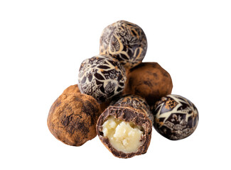 A pile of chocolate truffles, some whole, some sliced open, revealing a creamy filling.  The truffles are dark chocolate with a light, floral design, and coated in cocoa powder