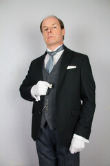 Butler in Formal Attire At Your Service. Professional Hospitality and Courtesy.