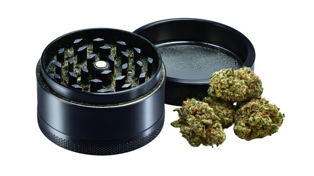 Cannabis grinder with marijuana buds isolated on a white background
