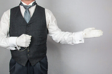 Butler or Hotel Concierge With Welcoming Gesture. Professional Hospitality or Courtesy.