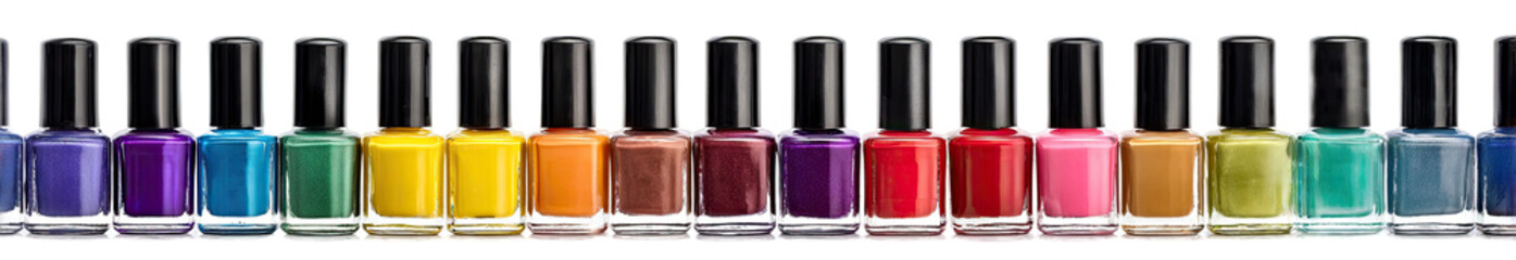 Row of nail polish bottles in various colors (3)