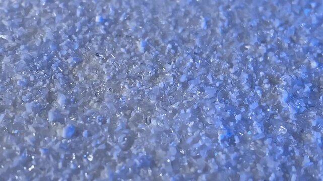 Salt crystals. Magnesium sulfate. Epsom salt. Salt particles. Slow motion video.High quality 4k footage