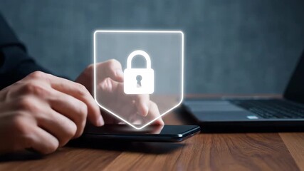 Close-up of hands operating a smartphone with a digital security shield and lock icon overlay. - Powered by Adobe
