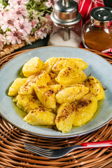 Homemade lazy noodles with cheese, crumbs and melted butter.